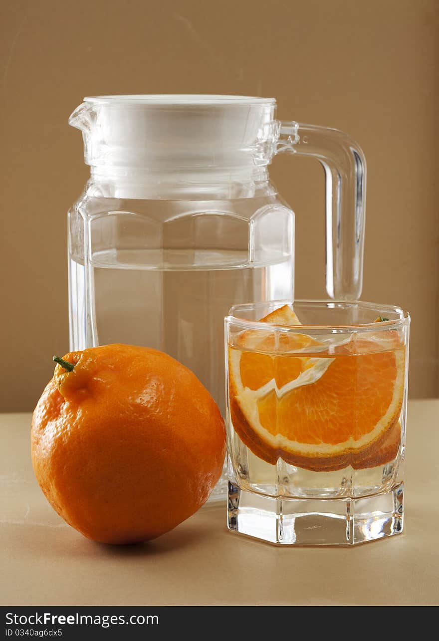 Oranges and glass cups