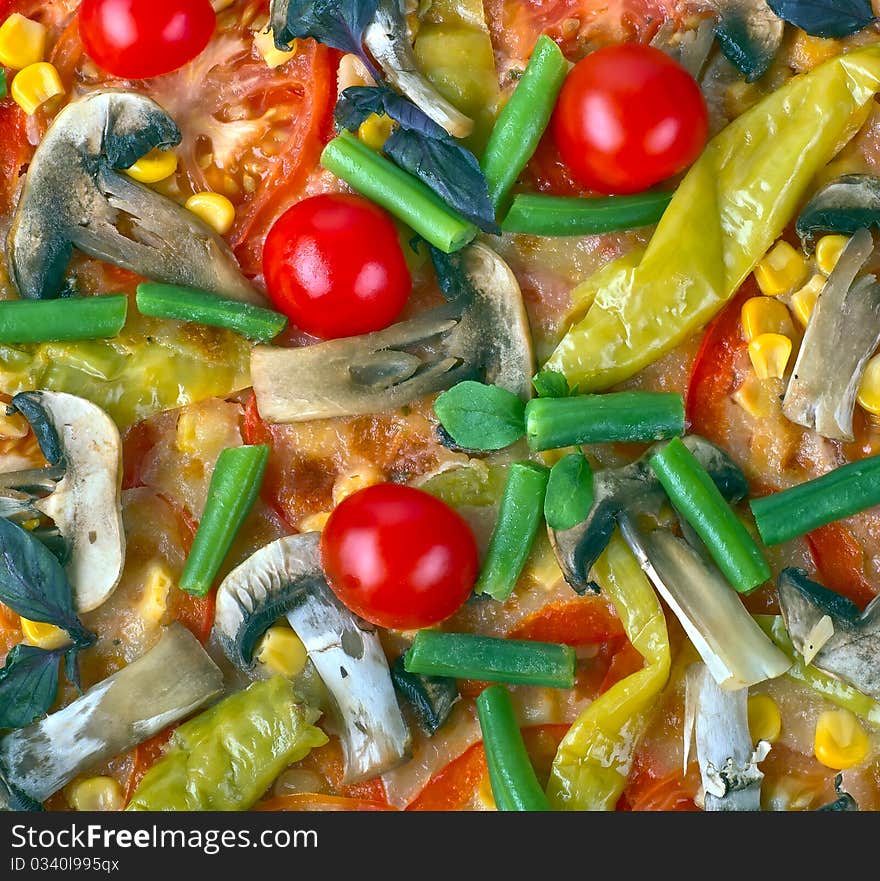 Pizza with mushrooms, tomatoes, peppers and herbs