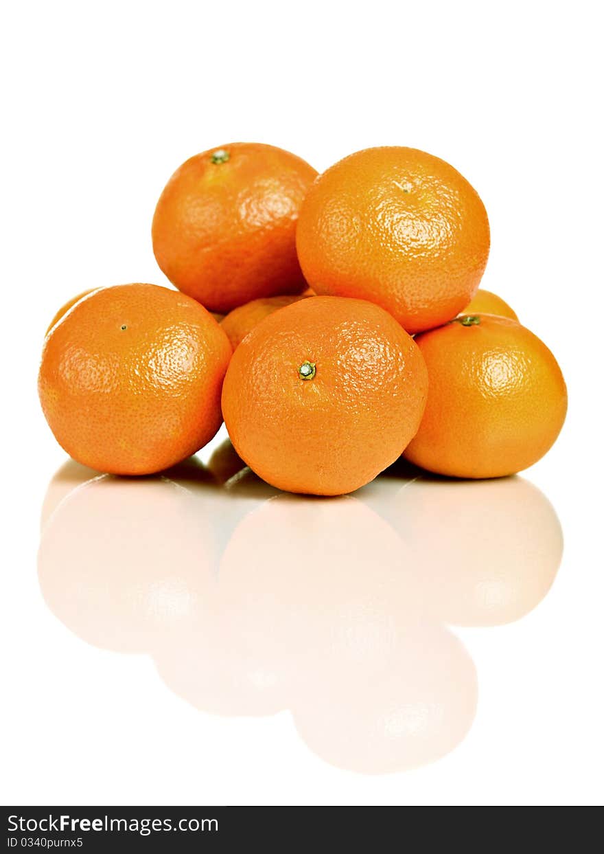 Group of mandarin fruit, isolated on white