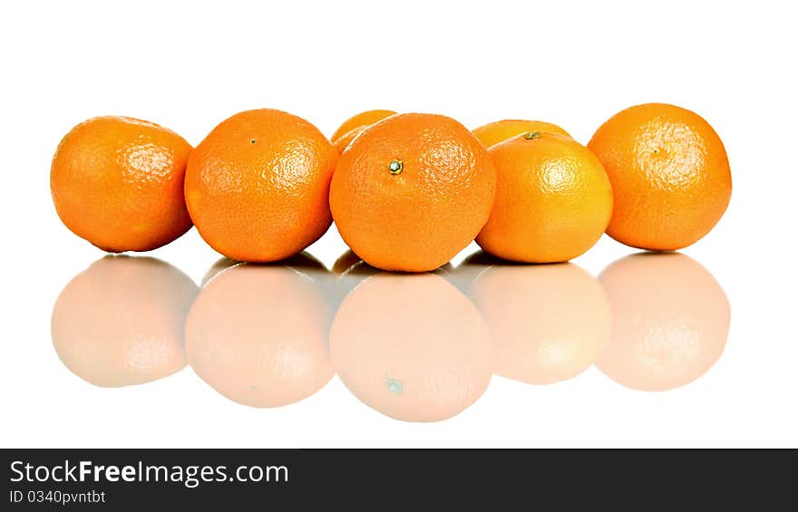 Group of mandarin fruit, isolated on white