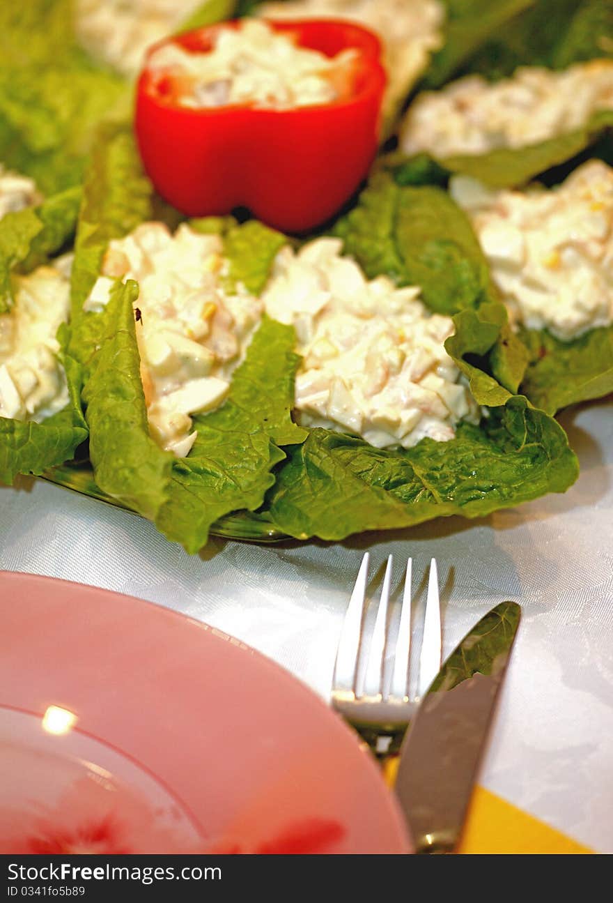 A green salad with pepper