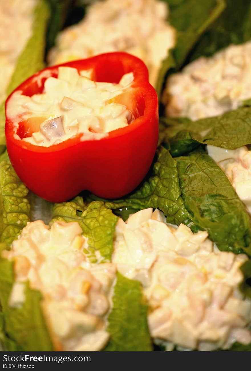 A green salad with pepper