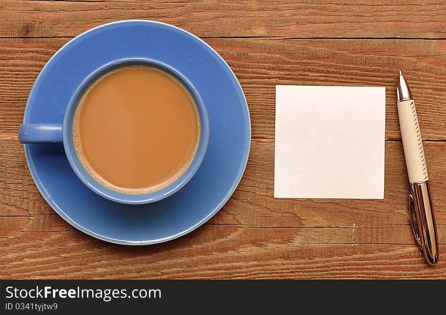 Blank card on coffee cup