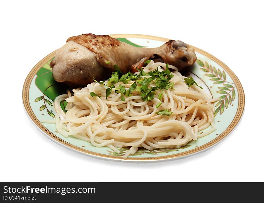 Plate of spaghetti and fried chicken