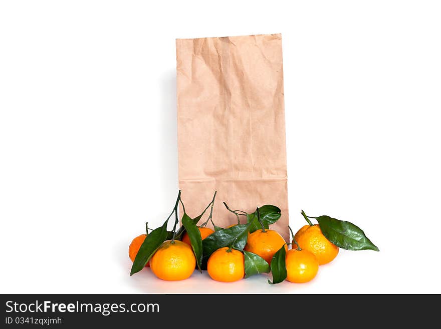 Tangerines with shopping bag