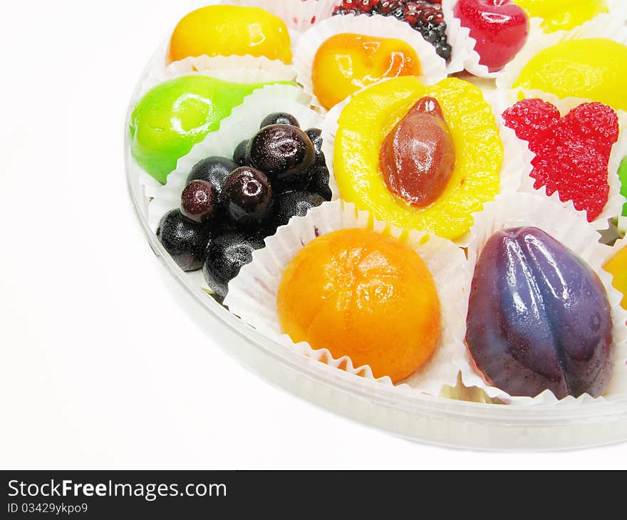 Marmalade gelatin fruits dessert covered with sugar isolated