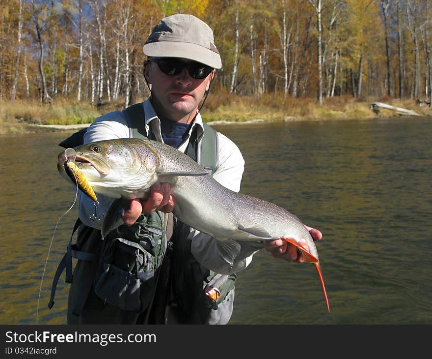 Fishing - fisherman catched big fish