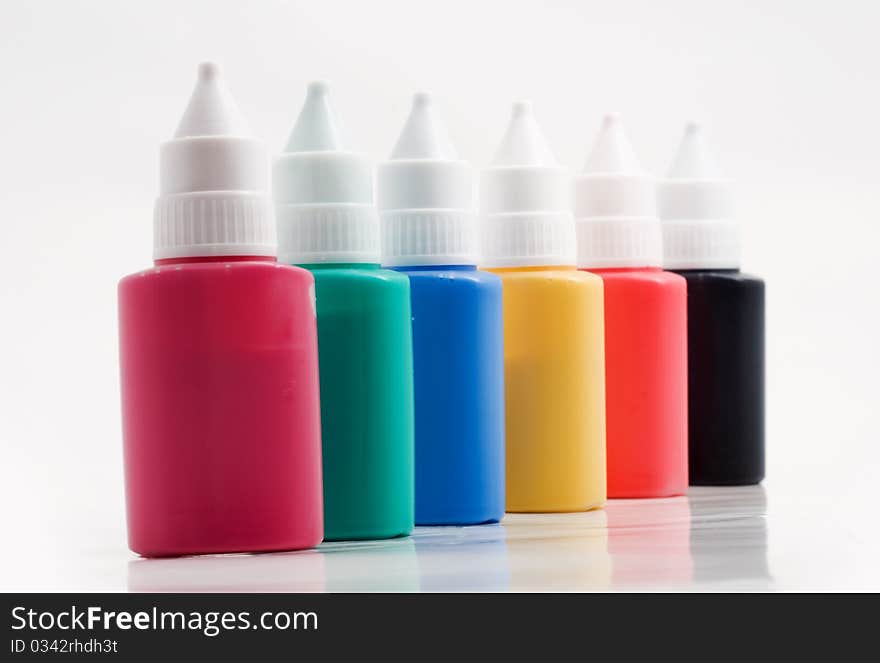 A set of plastic tubes with colored paint. A set of plastic tubes with colored paint