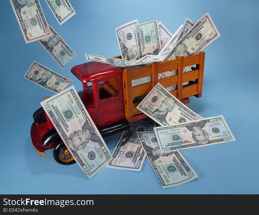 Truck with cash in bed and floating down from above. Truck with cash in bed and floating down from above.