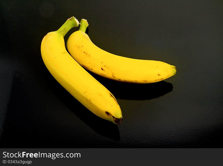 An image of bananas on a black background