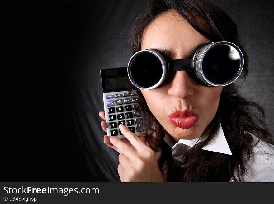 Woman in glasses with calculator. Woman in glasses with calculator