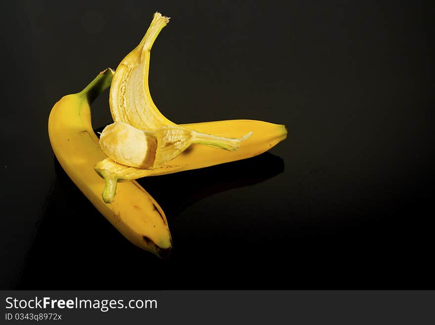 An image of bananas on a black background