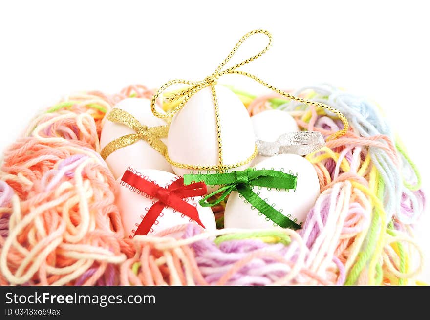 Easter eggs in a nest from threads