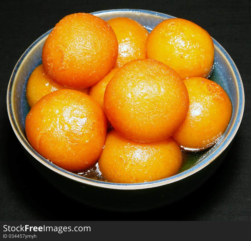 Fresh, hot and sweet gulabjamun in plate. Fresh, hot and sweet gulabjamun in plate