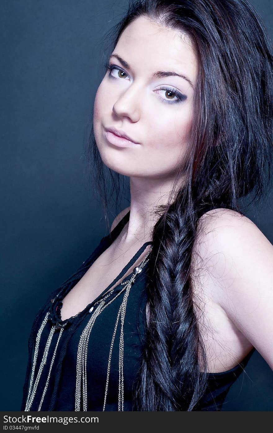 Glamourous Brunette On Dark Background