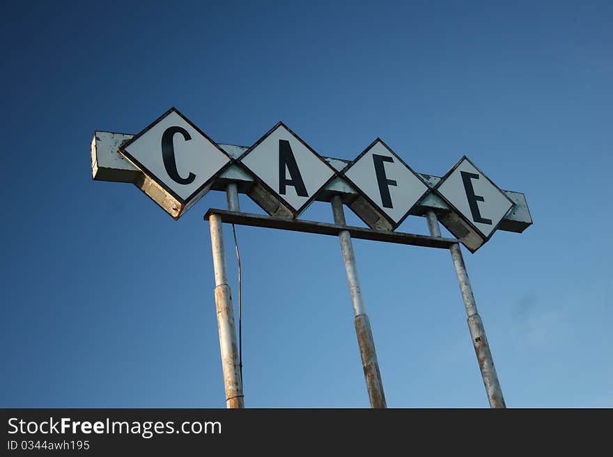 Route 66 Cafe sign along the road. Route 66 Cafe sign along the road