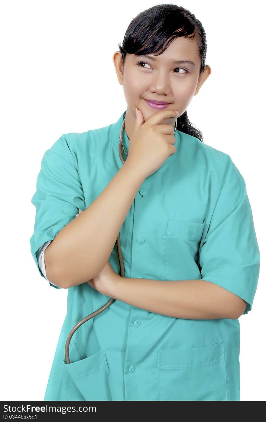 A Doctor wearing scrub thinking and isolated over white background. A Doctor wearing scrub thinking and isolated over white background