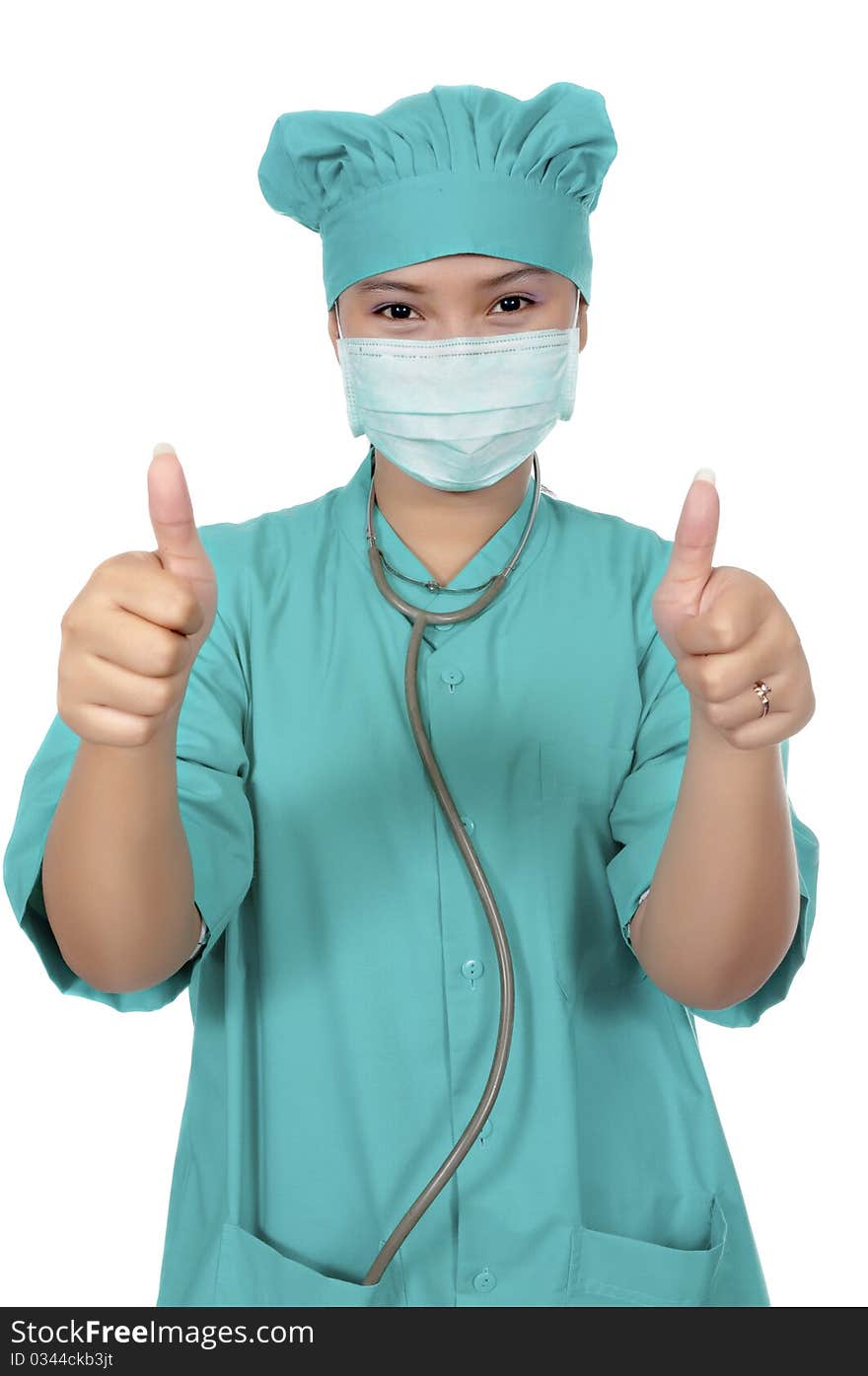 A Doctor wearing scrub and show her thumb isolated over white background. A Doctor wearing scrub and show her thumb isolated over white background