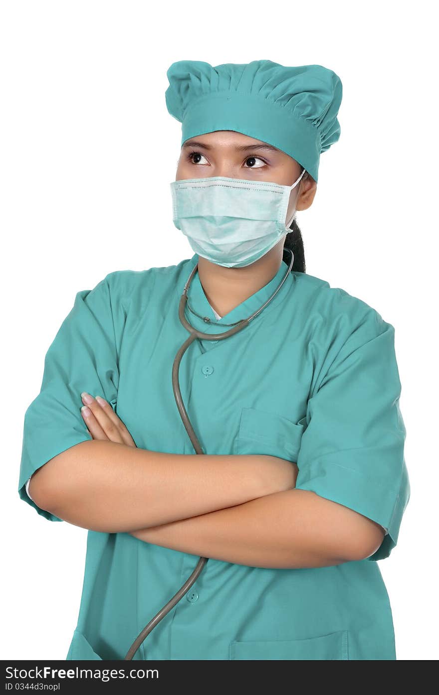 A Doctor wearing scrub isolated over white background. A Doctor wearing scrub isolated over white background