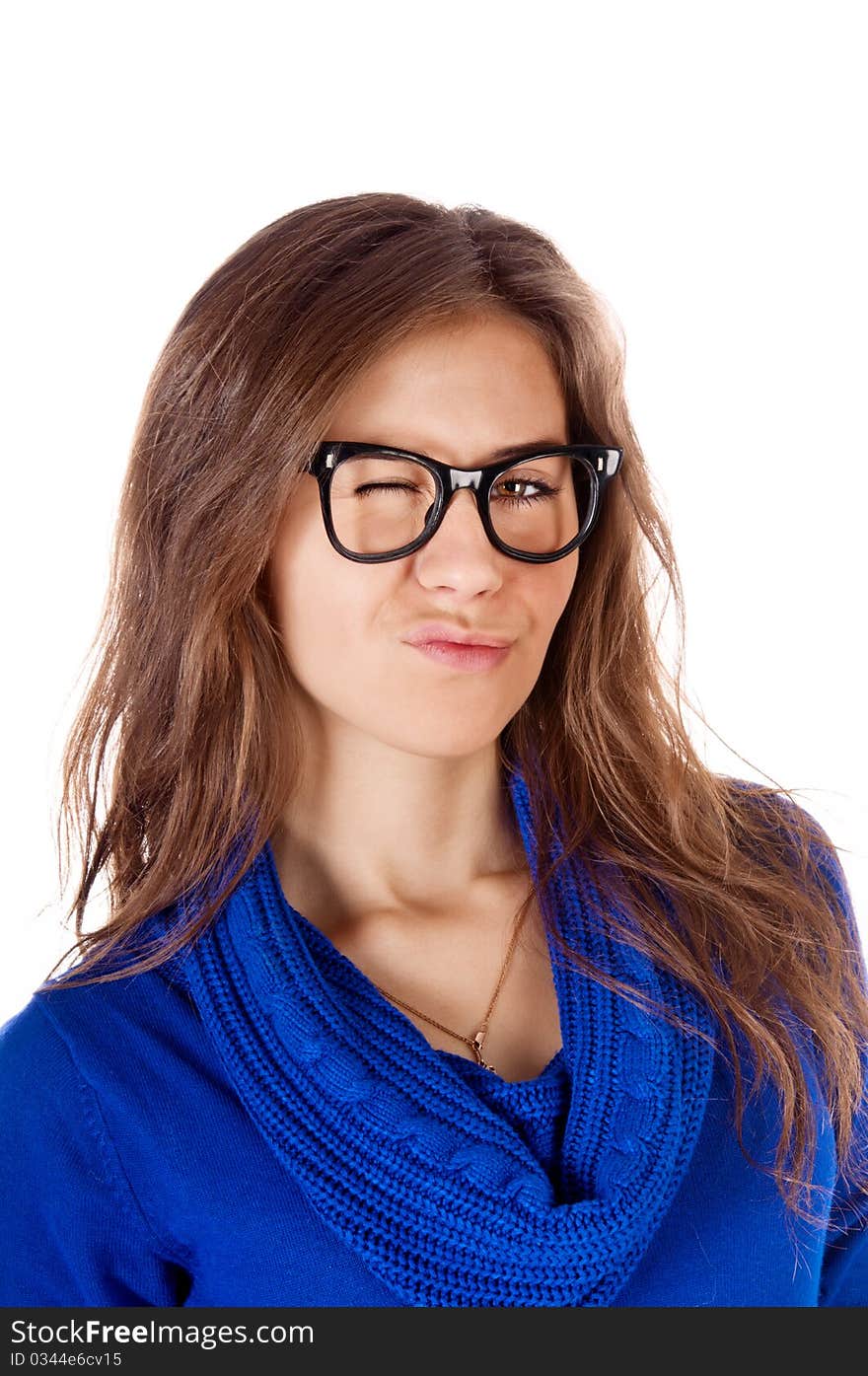 Portrait of the attractive grinning girl wearing spectacles. Isolated on white