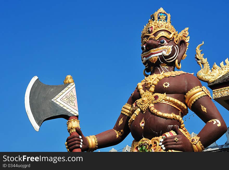 Brown giant in thai temple north of thailand