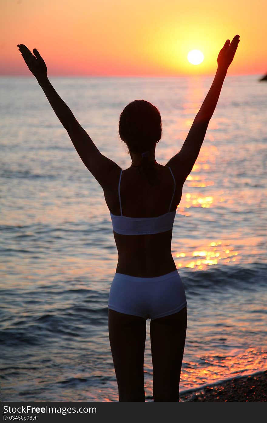 Woman Is Happy On The Beach.