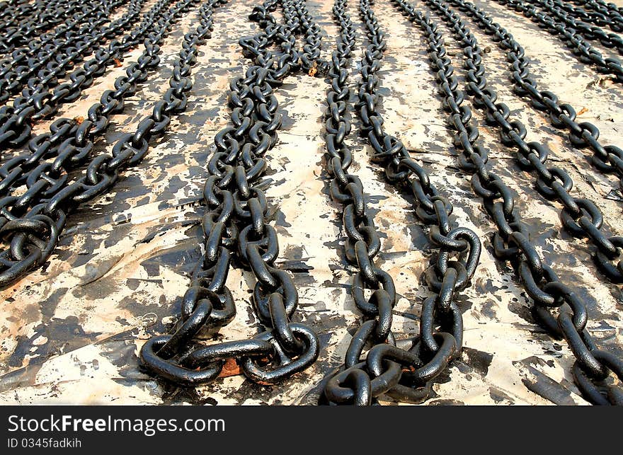 Ships anchor chain on the floor after painting