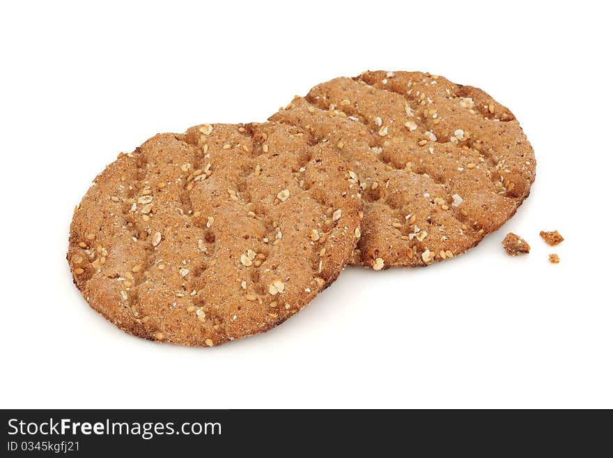 Multi grain crisp bread biscuits isolated over white background. Swedish specialty.