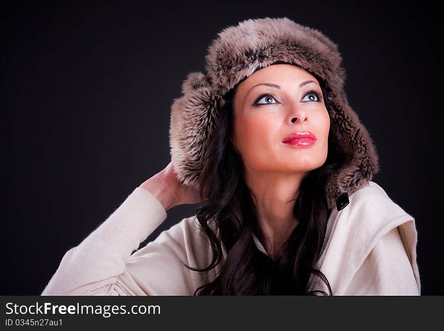 Attractive girl in winter fur hat