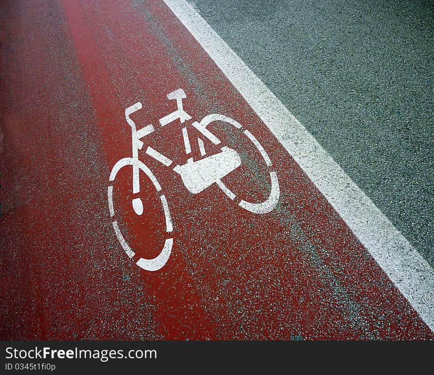 Bicycle sign painted on road