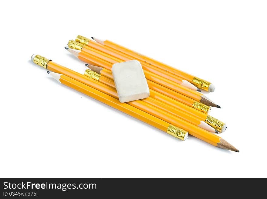 Pencils and eraser isolated on white