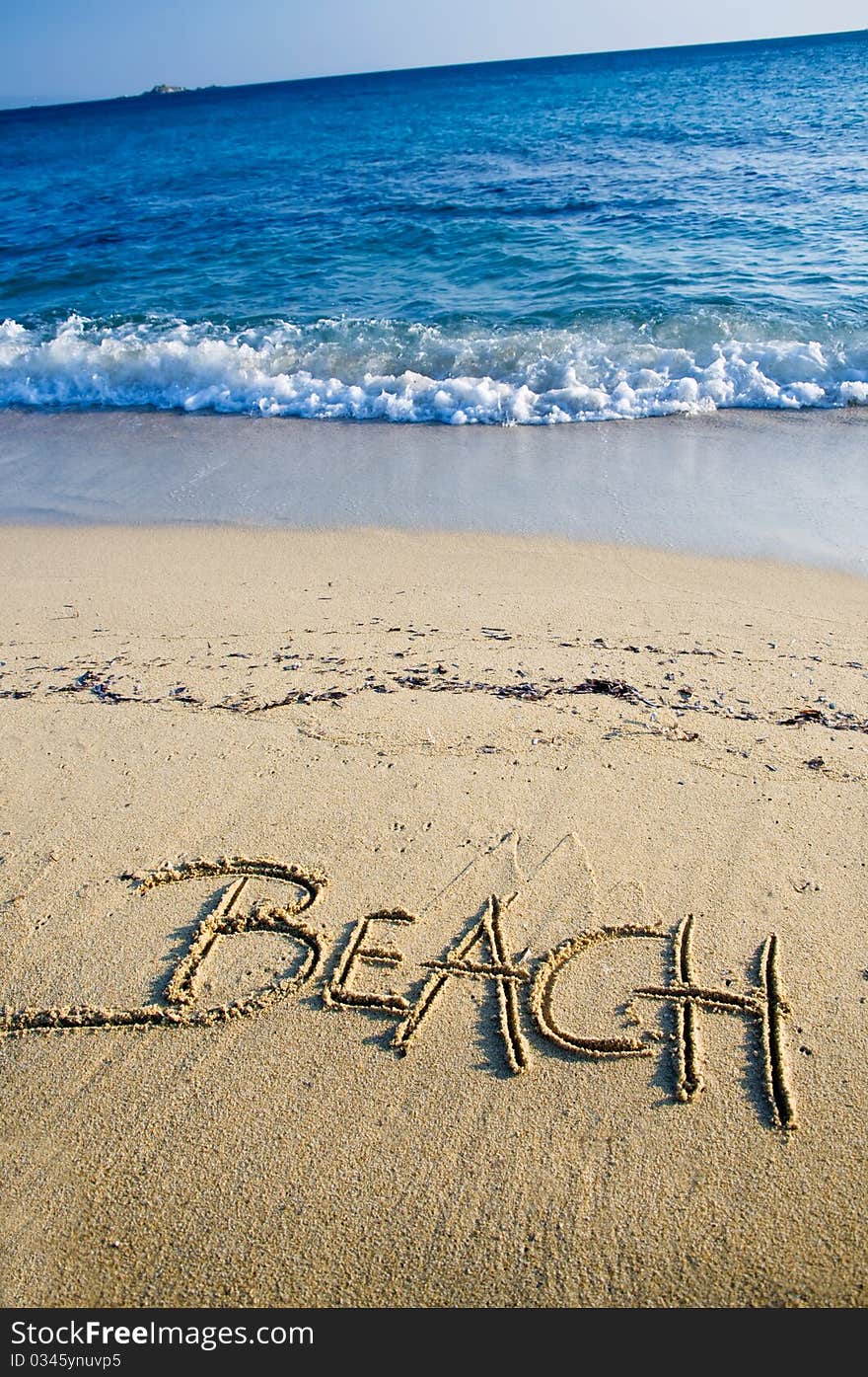 Beach written on the sand