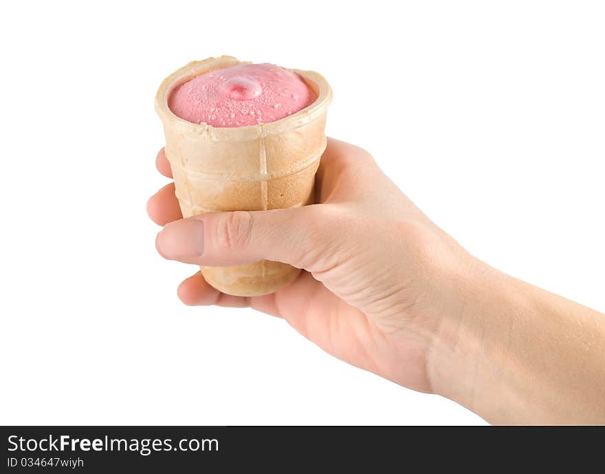 Pink ice cream in hand