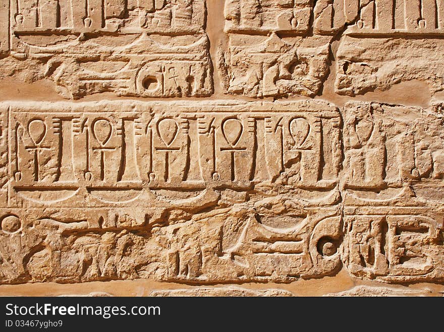 Old egypt hieroglyphs carved on the stone