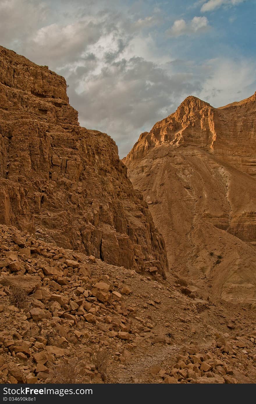 A detailed view of the cliffs around Ein Gedi Nature reserve in the morning light. A detailed view of the cliffs around Ein Gedi Nature reserve in the morning light.