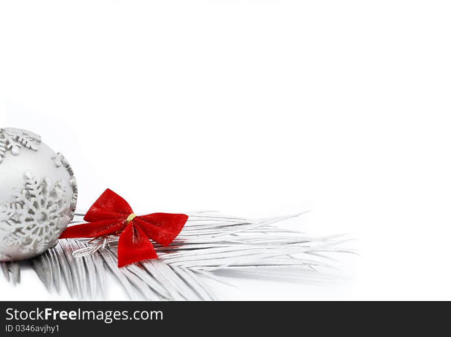 Silver candle and silver leaves as a christmas decoration