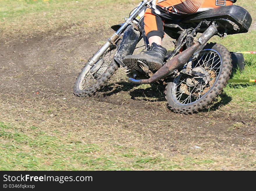 Funny rider and old motocycle