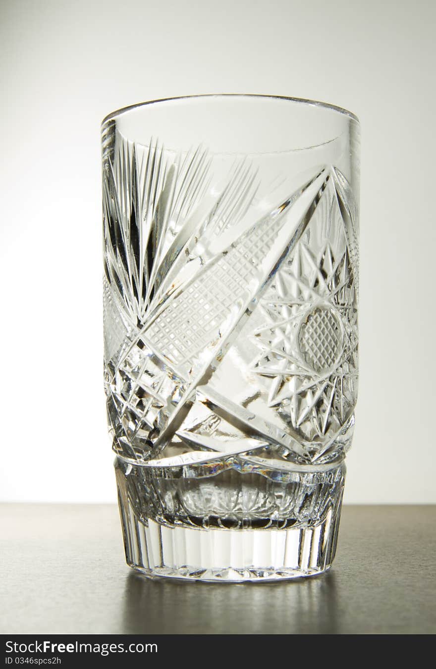Isolated crystal glass beaker with backlight