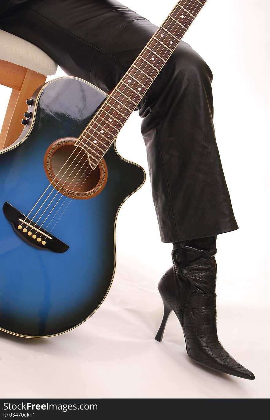 Blue Guitar and High Heeled Boot