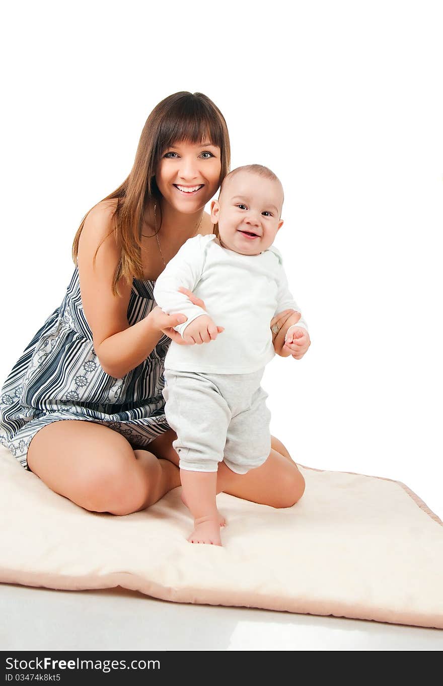 Pretty young women with her son isolated. Pretty young women with her son isolated