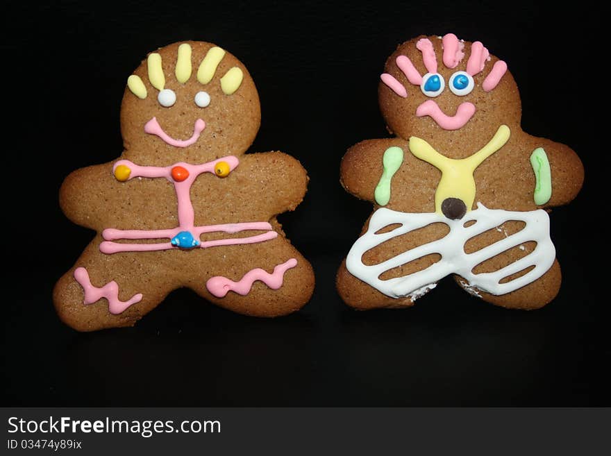 Ginger Bread Man and Woman on a black background. Ginger Bread Man and Woman on a black background