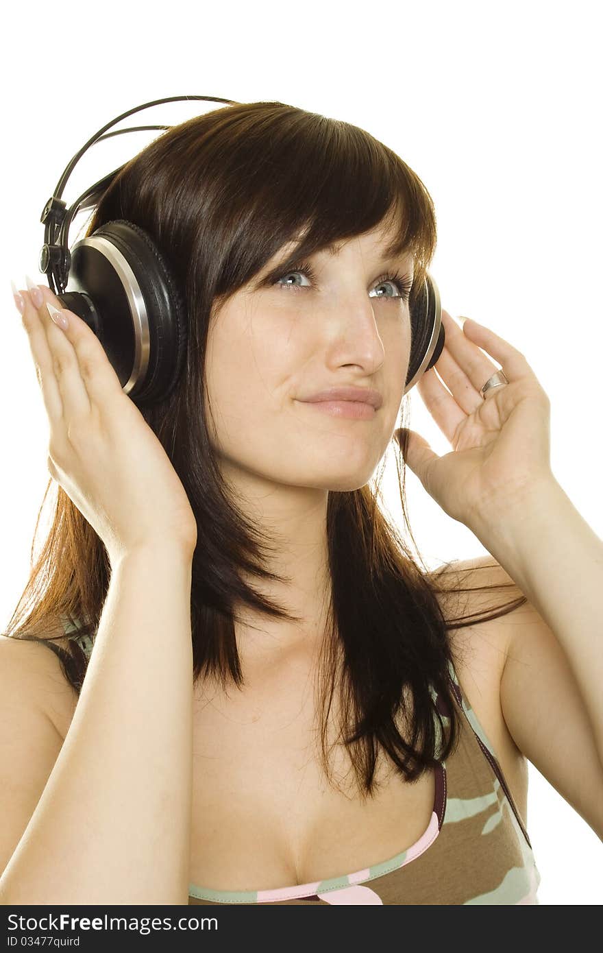 Woman listening to music and singing. Isolated on white background