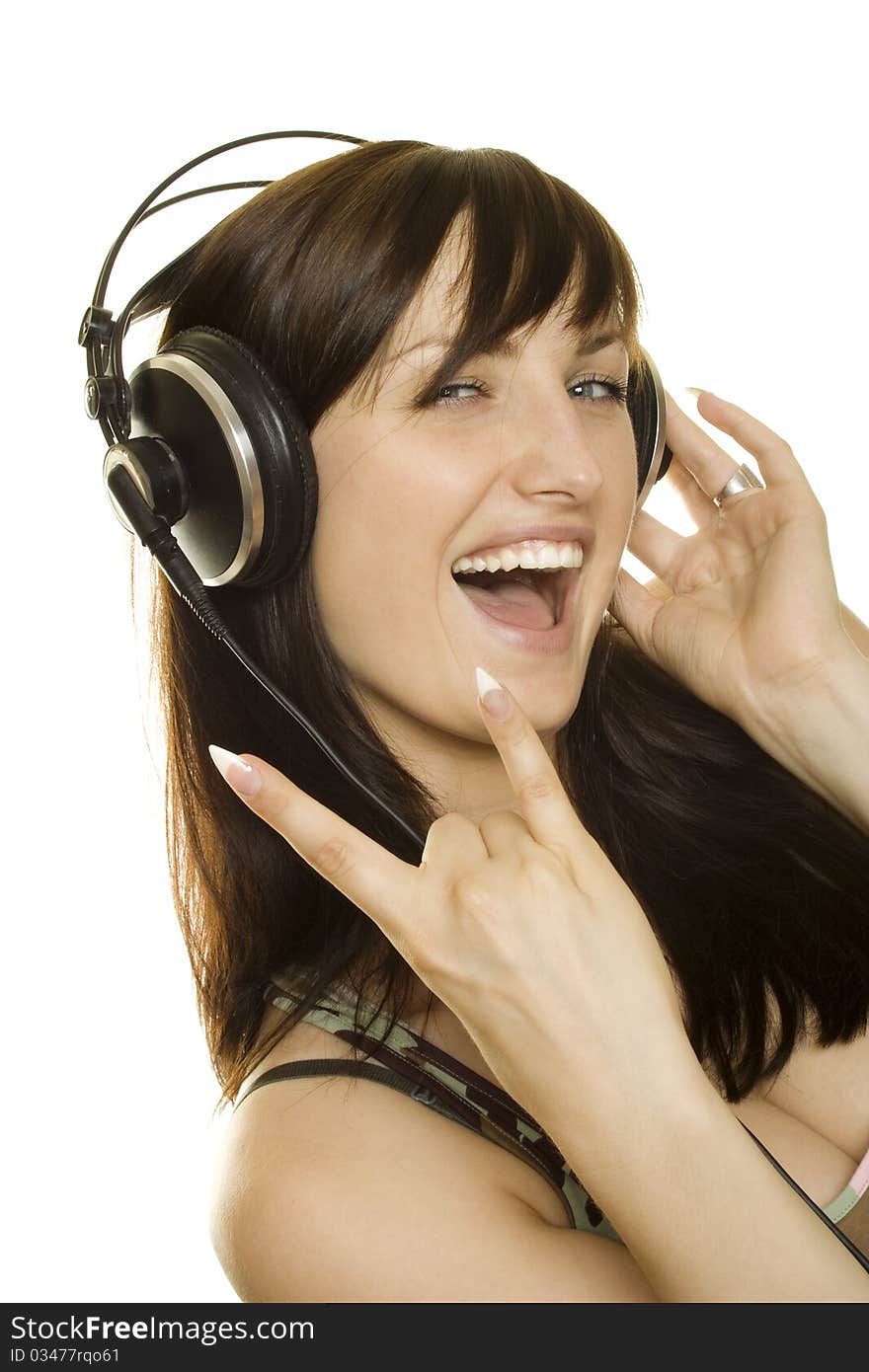 Woman listening to music and singing. Isolated on white background