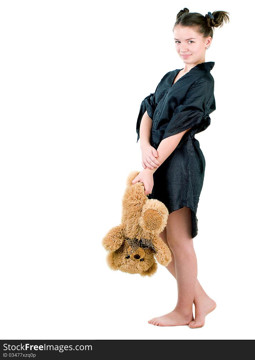 A girl holding her teddy bear. A girl holding her teddy bear