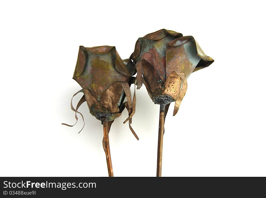 Two metal rose decorations