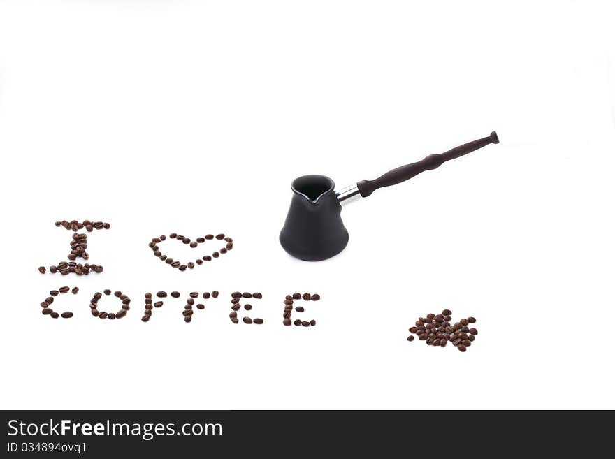 Coffee maker, small group of coffee beans and inscription made coffee beans. Coffee maker, small group of coffee beans and inscription made coffee beans