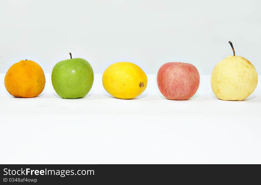 Five different fruits with white background