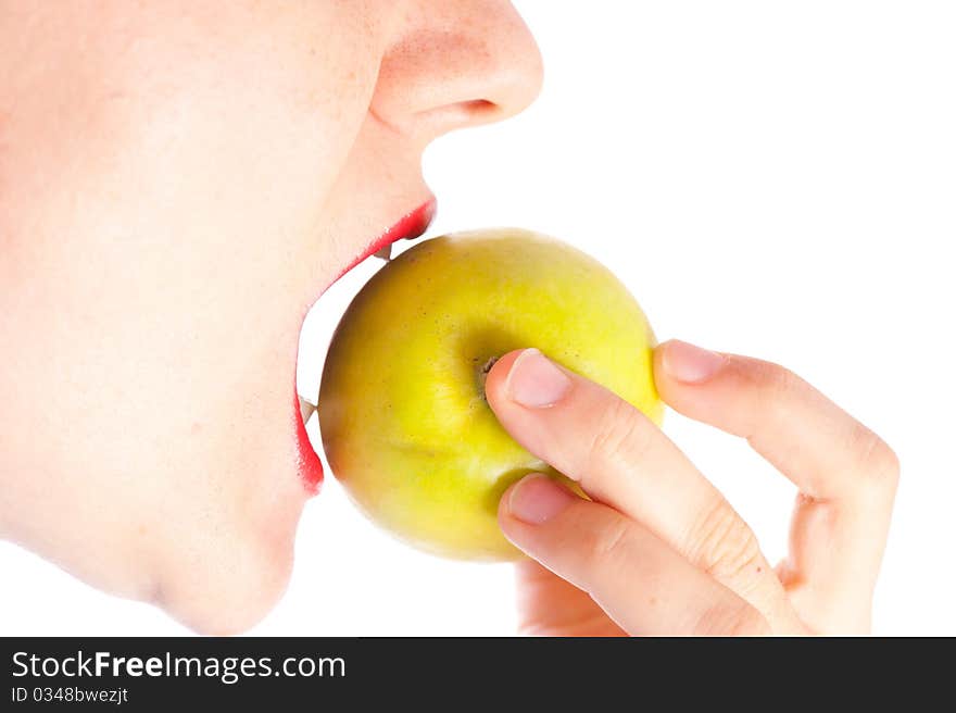 Girl eating green apple close up 2