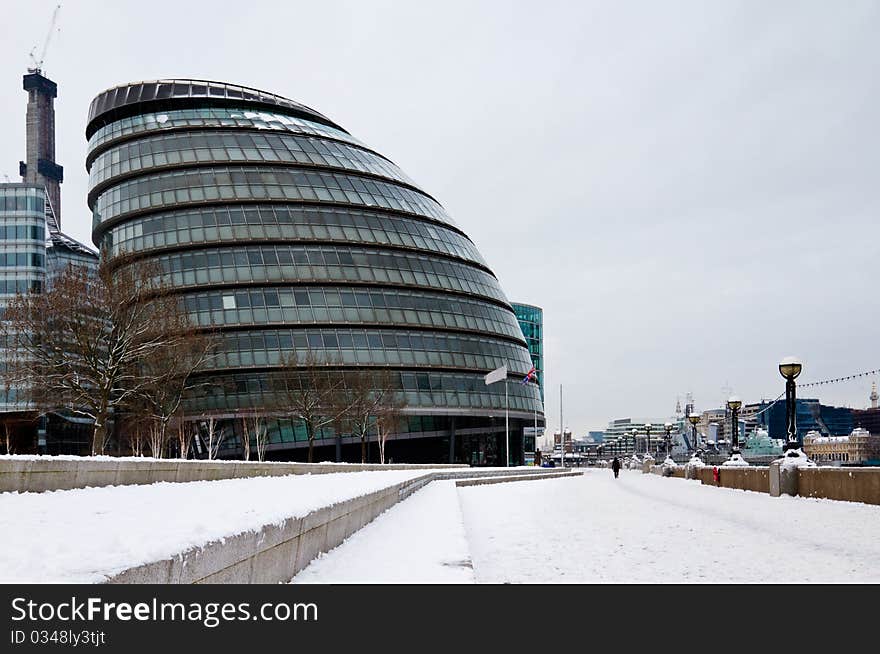 London city hall by thames river in snow. London city hall by thames river in snow