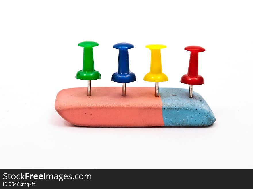 Varicoloured office button and lasting on white background